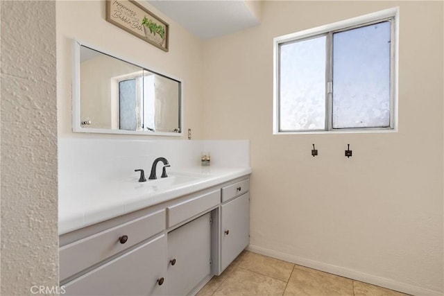 9415 Yucca St, Apple Valley, CA 92308 - bathroom featuring baseboards, vanity, and tile patterned floors