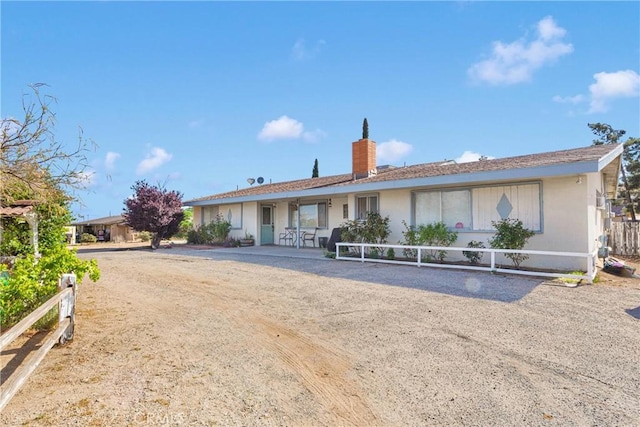 9415 Yucca St, Apple Valley, CA 92308 - single story home featuring fence and a chimney