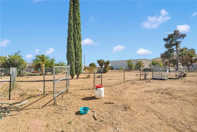 9415 Yucca St, Apple Valley, CA 92308 - view of playground with a rural view and fence