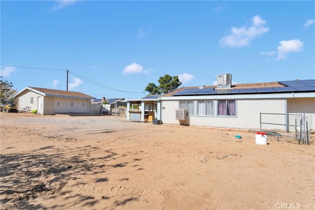 9415 Yucca St, Apple Valley, CA 92308 - back of property with fence and solar panels