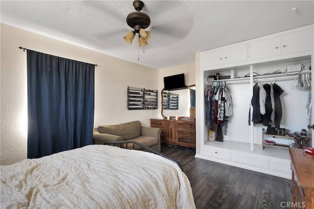 9415 Yucca St, Apple Valley, CA 92308 - bedroom with ceiling fan, dark wood-style flooring, a textured ceiling, and a closet