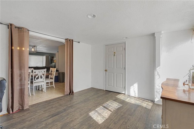 9415 Yucca St, Apple Valley, CA 92308 - entrance foyer with wood finished floors and a textured ceiling