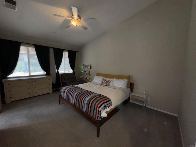 bedroom with ceiling fan, vaulted ceiling, carpet flooring, and visible vents
