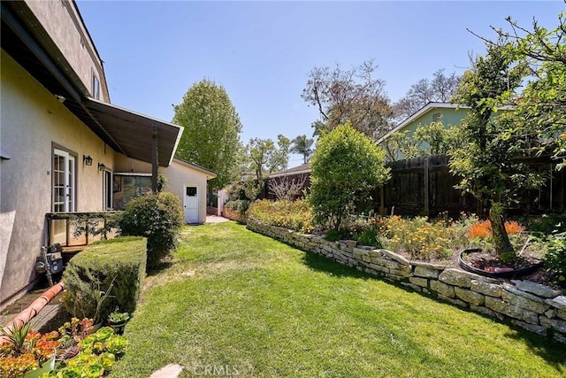 view of yard featuring fence