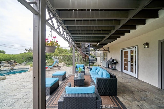 view of patio featuring outdoor lounge area, an outdoor pool, french doors, area for grilling, and stairway