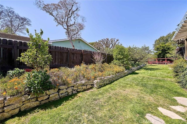 view of yard with fence