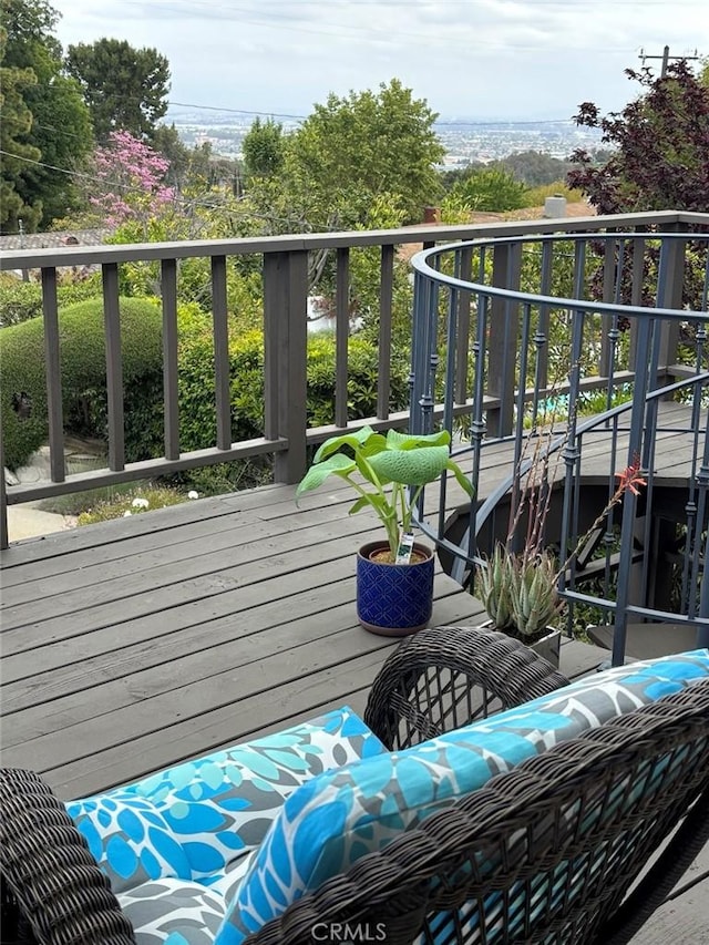 view of wooden balcony with a wooden deck