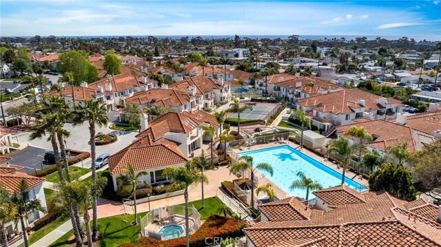birds eye view of property with a residential view