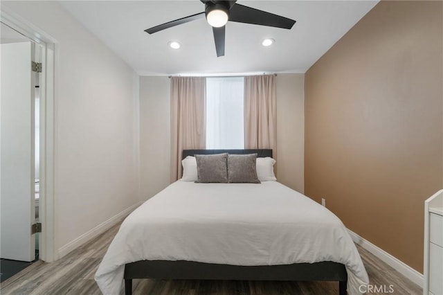 bedroom with recessed lighting, baseboards, a ceiling fan, and light wood-style flooring