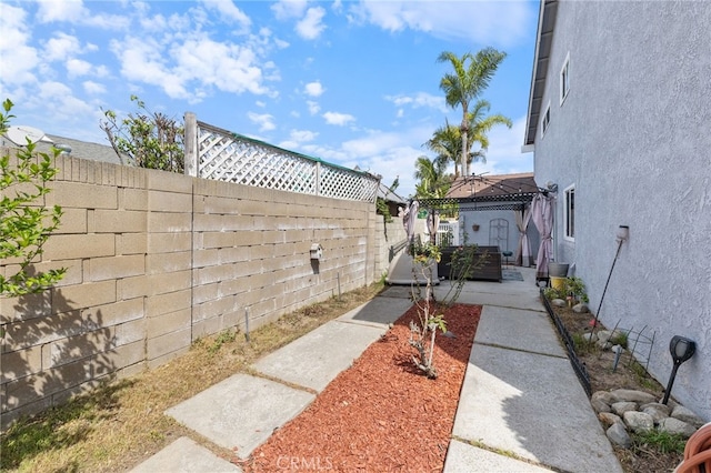 2102 Tern Bay Ln, Lakewood, CA 90712 - fenced backyard featuring a patio and a gazebo