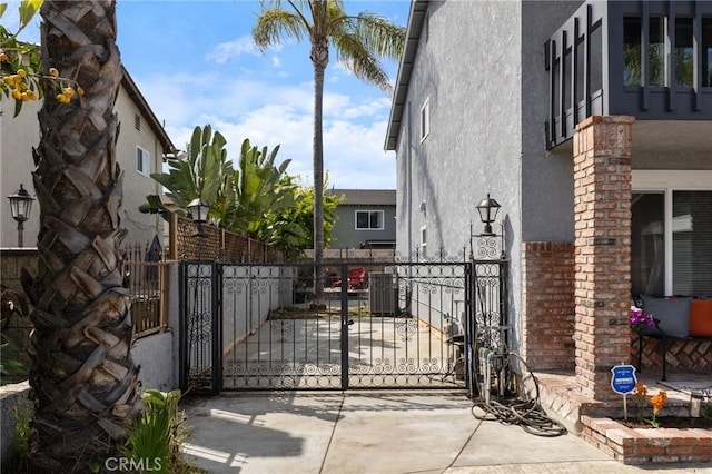 2102 Tern Bay Ln, Lakewood, CA 90712 - gate featuring central air condition unit and fence