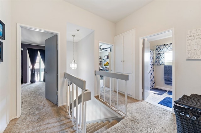 2102 Tern Bay Ln, Lakewood, CA 90712 - hall with an upstairs landing, carpet, and healthy amount of natural light