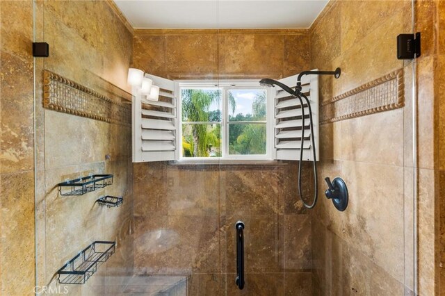 bathroom featuring a shower stall