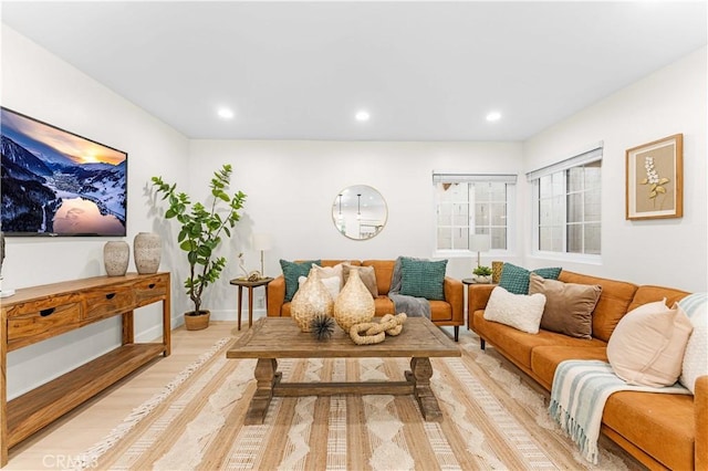 living room featuring recessed lighting and light wood-style floors