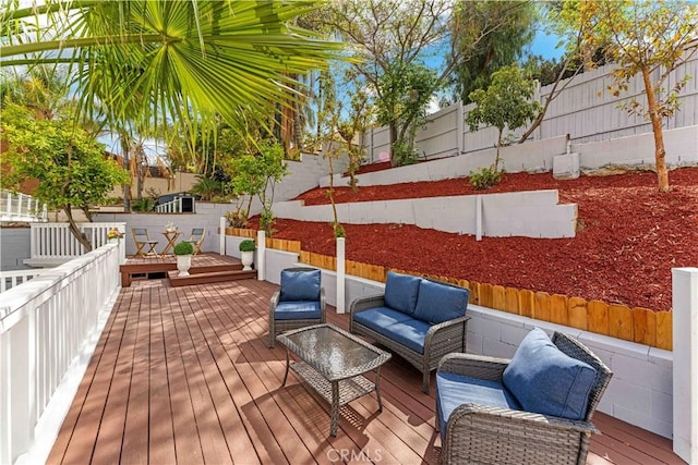 20163 Corona St, Corona, CA 92881 - wooden deck featuring an outdoor hangout area and a fenced backyard