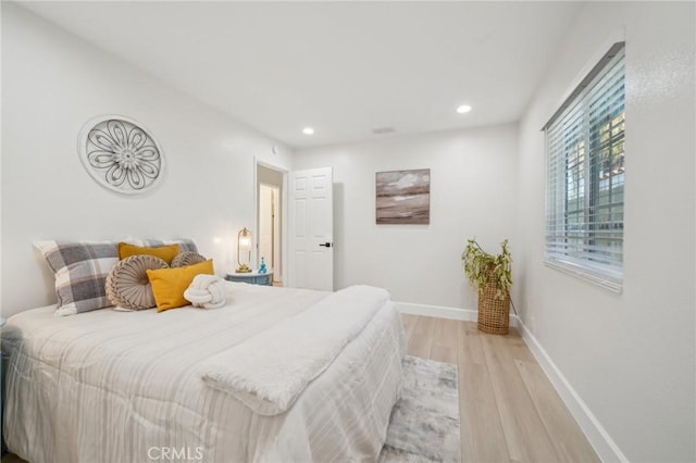 20163 Corona St, Corona, CA 92881 - bedroom featuring light wood finished floors, recessed lighting, and baseboards