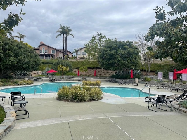 9 Pembroke Ln, Laguna Niguel, CA 92677 - community pool featuring a patio area