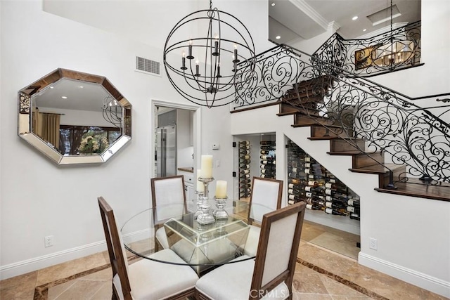 9 Pembroke Ln, Laguna Niguel, CA 92677 - dining space with inlaid floor details, a chandelier, baseboards, a high ceiling, and recessed lighting
