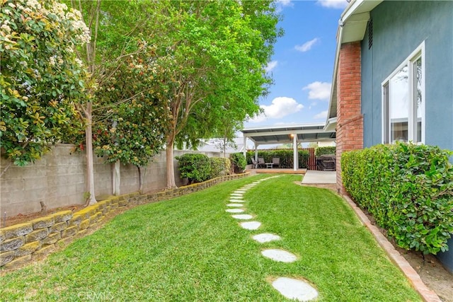 view of yard featuring a fenced backyard