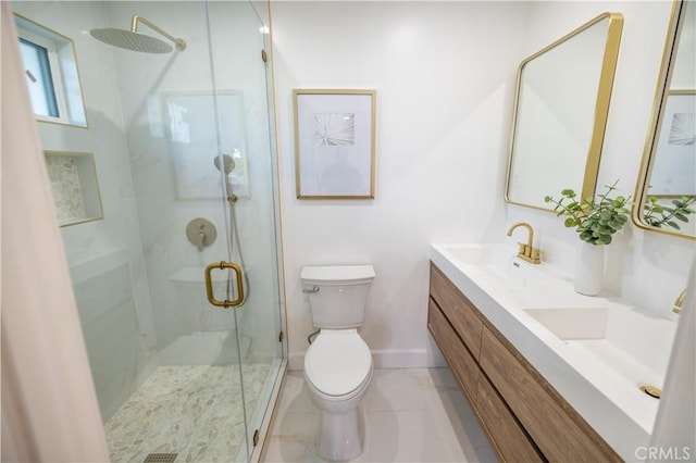 full bathroom featuring a marble finish shower, a sink, double vanity, toilet, and baseboards