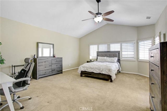 bedroom with baseboards, lofted ceiling, and light carpet