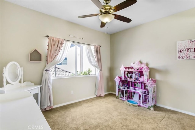 bedroom featuring carpet flooring, a ceiling fan, and baseboards