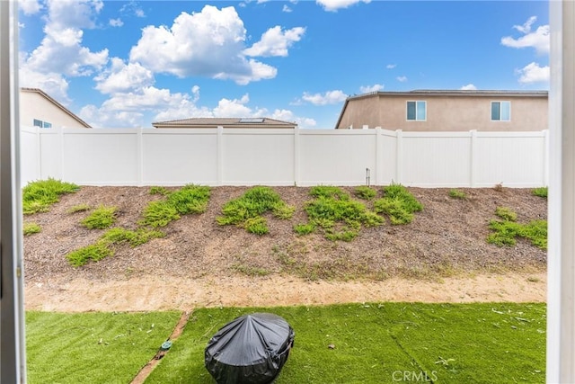 view of yard featuring a fenced backyard