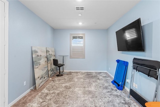 interior space with baseboards, carpet, recessed lighting, and visible vents