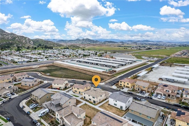 aerial view with a residential view and a mountain view