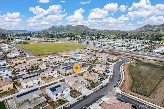 aerial view featuring a mountain view and a residential view