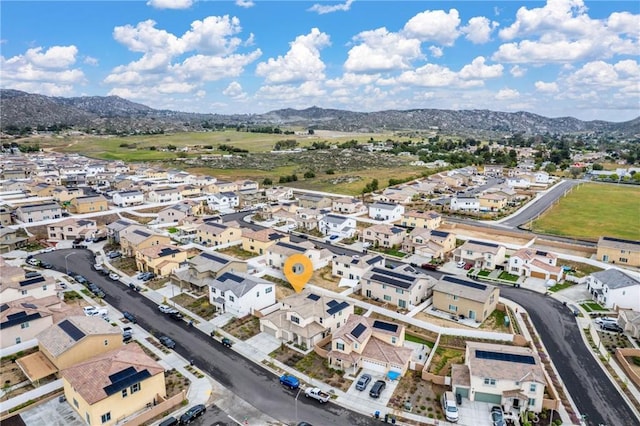 drone / aerial view featuring a mountain view and a residential view