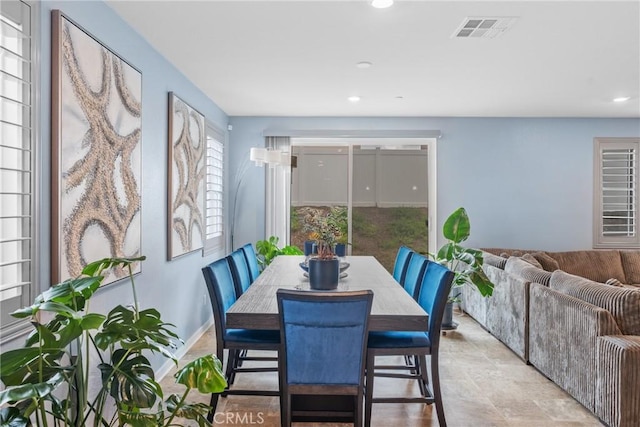 dining room with baseboards, recessed lighting, and visible vents