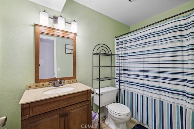 13138 Pan Am Blvd, Moreno Valley, CA 92553 - bathroom featuring toilet, vanity, a shower with shower curtain, and a textured wall
