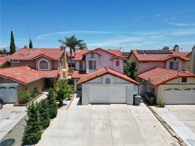 13138 Pan Am Blvd, Moreno Valley, CA 92553 - mediterranean / spanish-style home featuring driveway, stucco siding, and a residential view