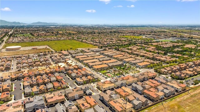 drone / aerial view with a mountain view and a residential view