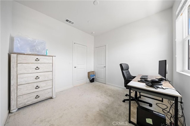 home office with baseboards, carpet flooring, and visible vents