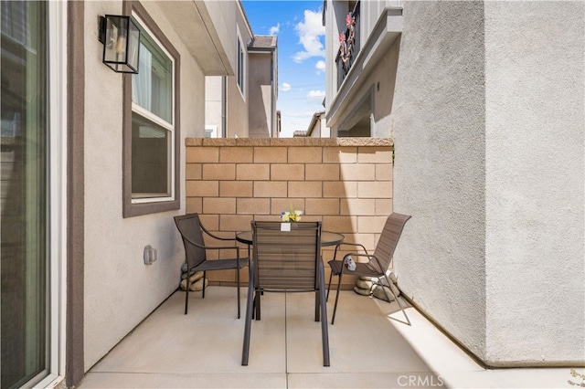 exterior space with outdoor dining area