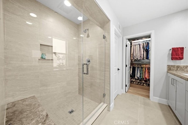 2902 Foundry Ct, Redondo Beach, CA 90278 - full bath featuring vanity, tile patterned flooring, a stall shower, and a spacious closet