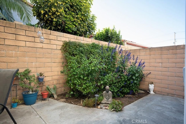 view of patio featuring a fenced backyard
