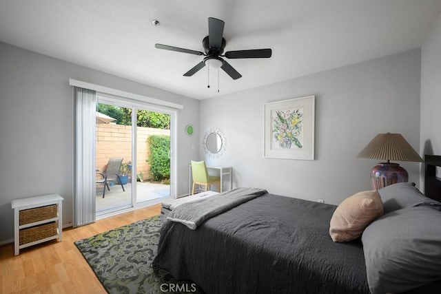 5624 Orange Ave, Cypress, CA 90630 - bedroom featuring access to exterior, light wood-type flooring, a ceiling fan, and baseboards