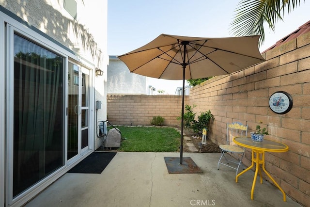 view of patio with a fenced backyard