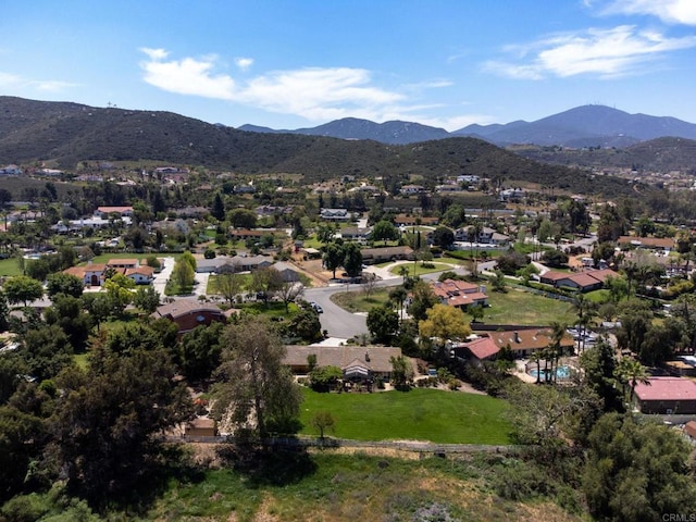bird's eye view featuring a residential view and a mountain view