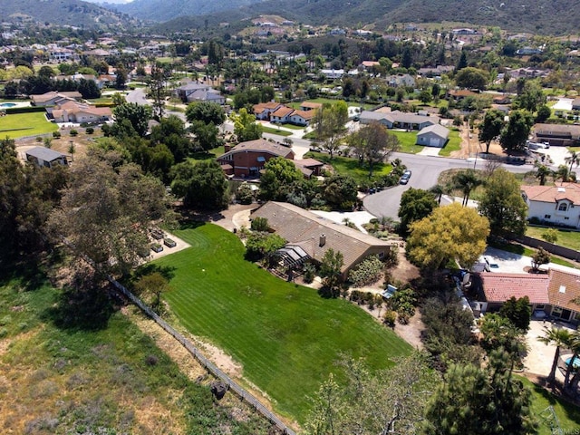 aerial view with a residential view and a mountain view