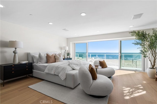 105A Surfside Ave, Surfside, CA 90743 - bedroom featuring wood finished floors, access to exterior, and recessed lighting