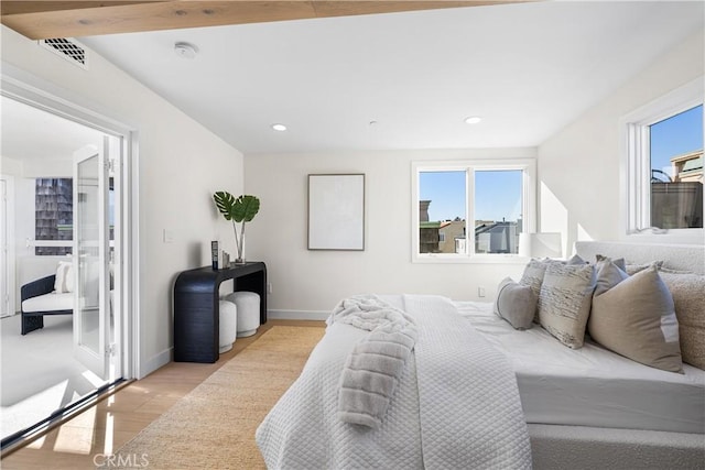 105A Surfside Ave, Surfside, CA 90743 - bedroom with light wood-style flooring, multiple windows, and recessed lighting