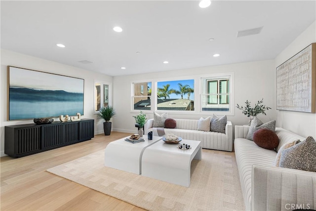 105A Surfside Ave, Surfside, CA 90743 - living room featuring light wood-type flooring and recessed lighting