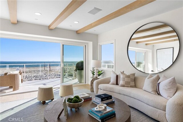 105A Surfside Ave, Surfside, CA 90743 - living room with beamed ceiling, a water view, wood finished floors, and recessed lighting