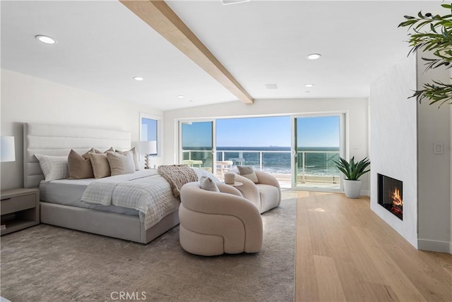 105A Surfside Ave, Surfside, CA 90743 - bedroom with wood finished floors, a fireplace, recessed lighting, a water view, and access to outside