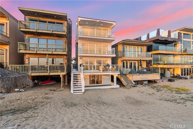 105A Surfside Ave, Surfside, CA 90743 - back of property at dusk featuring stairway