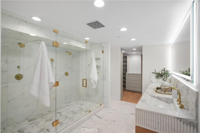 105A Surfside Ave, Surfside, CA 90743 - full bath featuring recessed lighting, vanity, a marble finish shower, and marble finish flooring